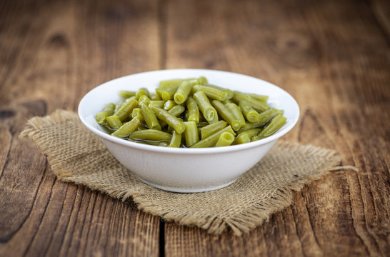 Portion of preserved Green Beans (selective focus; close-up shot)