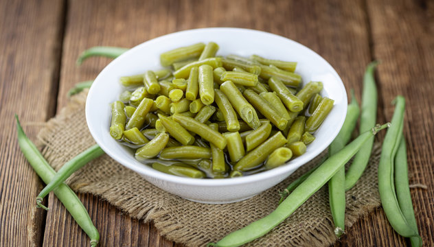 Portion of preserved Green Beans (selective focus; close-up shot)