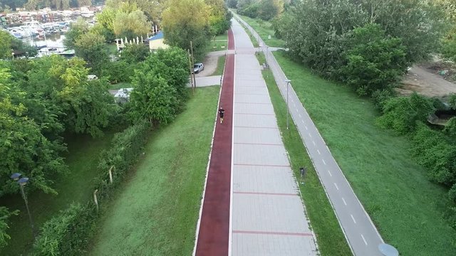 Novi Sad. Novosadski kej. Most slobode. Man jogging
