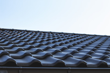 roof tiles close up on blue sky 