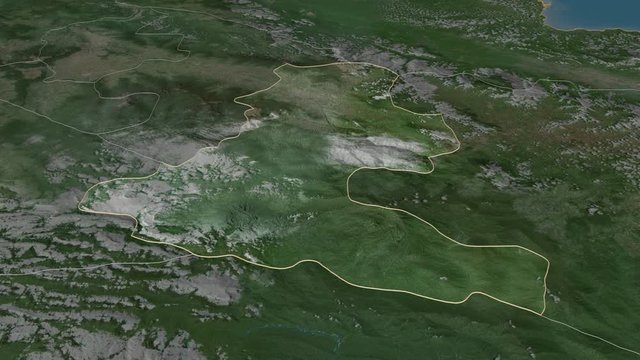 Chimbu, province with its capital, zoomed and extruded on the satellite map of Papua in the conformal Stereographic projection. Animation 3D
