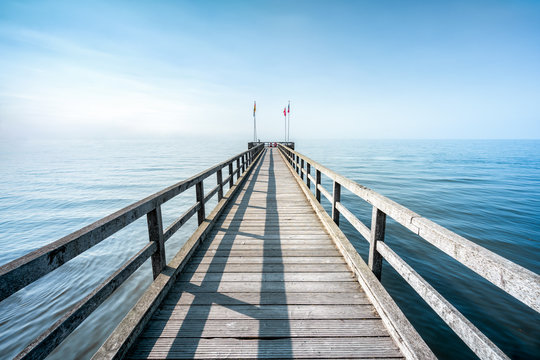 Fototapeta Wooden pier at the sea