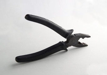 pliers with insulated handles on a white background