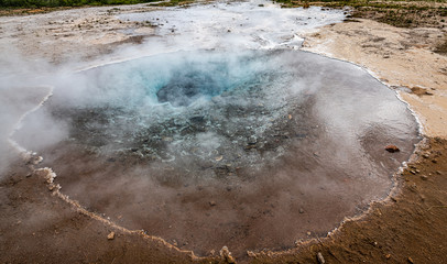Hot springs in Haukadalur geothermal area along the golden circle, Iceland
