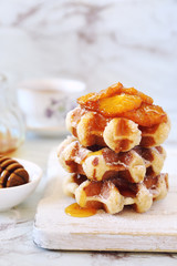 Belgian waffles with caramelized orange and honey for breakfast
