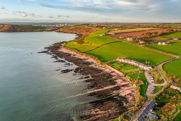 Amazing view aerial drone Irish Coastal Coastline Roches Point Lighthouse beach - obrazy, fototapety, plakaty