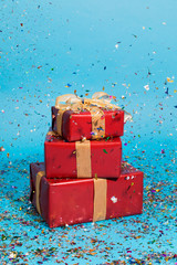 Festive red presents and confetti