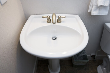 Clean white pedastal sink
