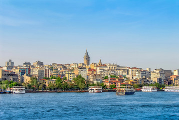 Fototapeta na wymiar Beyoglu, Istanbul, Turkey, 17 May 2015: Galata Tower, City Lines Ferries, King of Byzantine Anastasius, 528