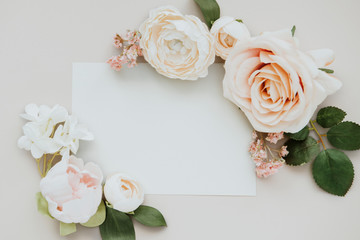 Fototapeta na wymiar Blank invitation with rose decoration