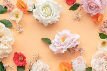 Obraz na płótnie Canvas Flower arrangement on orange background