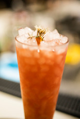 Fresh cold carrot juice with ice, selective focus