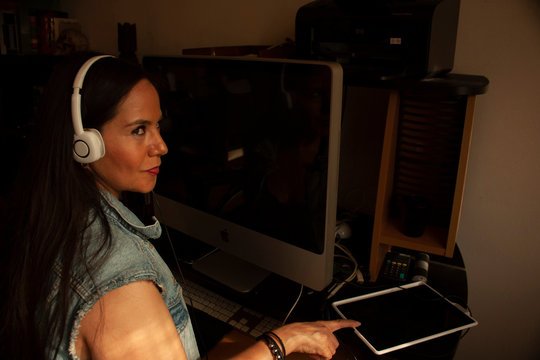 .Smiling Woman Being Productive In Home Office