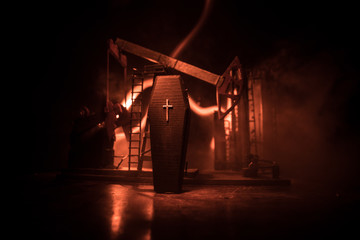 Stock market declining chart and oil pump jack - abstract background