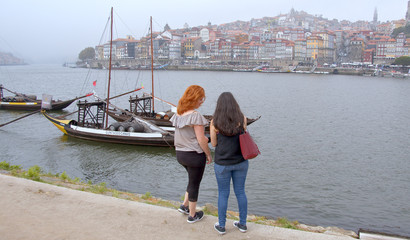 Two women on a sightseeing trip to Porto in Portugal - travel photography