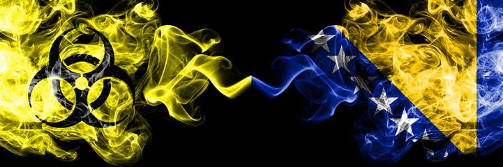 Quarantine in Bosnia and Herzegovina, Bosnian. Coronavirus COVID-19 lockdown. Smoky mystic flag of Bosnia and Herzegovina, Bosnian with biohazard symbol placed side by side.