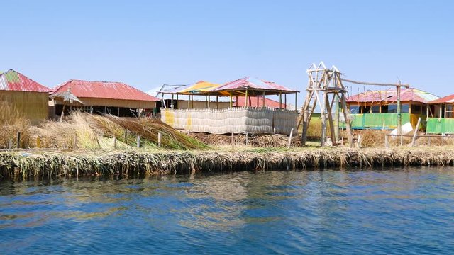 Peru Titicaca thatched dwellings on a floating island