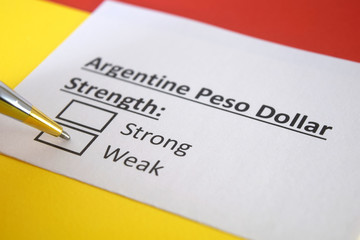 One person is answering question about strength of Argentine poso dollar.