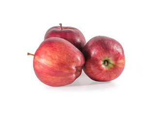 A set of three fresh red apples with drops isolated on white background