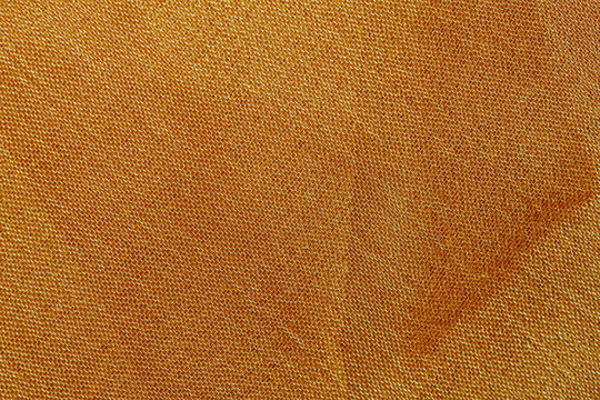 beautiful yellow texture of cloth in abstract macro for background