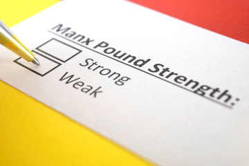 One person is answering question about strength of Manx Pound.