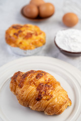 Cooked bread with ingredients Eggs and tapioca flour in a cup.