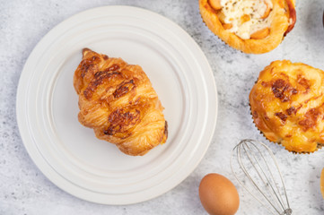 Cooked bread with ingredients Eggs and tapioca flour in a cup.