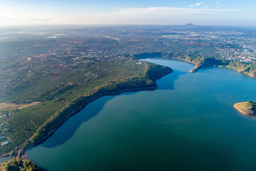 Aerial view of  To Nung lake or T’nung lake near  Pleiku city, Gia Lai province, Vietnam. To Nung lake or T’nung lake on the lava background of a volcano that has stopped working