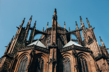 Fototapeta na wymiar Gorgeous view of Gothic capel cathedral , Monument of German Roman Catholicism Neogothic architecture .the Catholic St. Vitus, Wenceslas and Adalbert in Prague. Aerial panoramic drone sky view