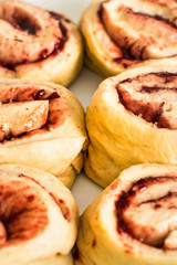 Rolled buns filled with cherry jam