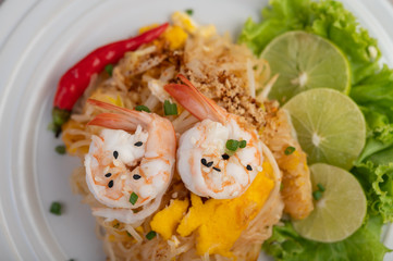 Pad Thai fresh shrimp in a white plate.