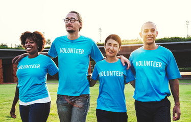 Group of happy and diverse volunteers