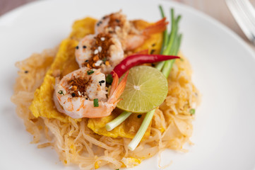 Pad Thai fresh shrimp in a white plate.