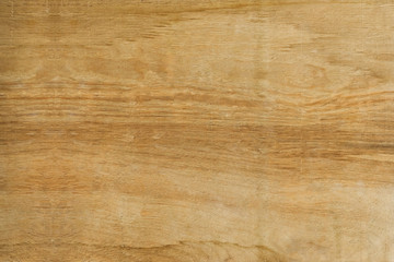 Scratched beige wooden textured background