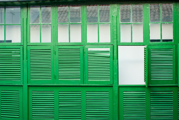 Broken pattern of green windows.