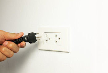 man unplug power cable cord