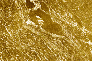 Gold metallic stone wall