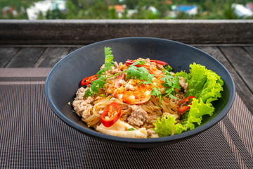 Hu Tieu Nam Vang or Hu Tiu Nam Vang Vietnamese food, Phnom-penh clear rice noodle soup, famous food originated from Cambodia at Phu Quoc island, Vietnam. High view to Duong Dong town