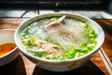 Bun Quay Vietnamese food or Quay rice noodle on wood background, famous food at Phu Quoc island, Kien Giang, Vietnam.