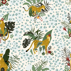 Seamless pattern with wild jungle cheetahs’ animals in different poses and exotics floral and leaves. Tropical cats with leopard print skin. Great for wrap paper, wallpapers, web, surface textile