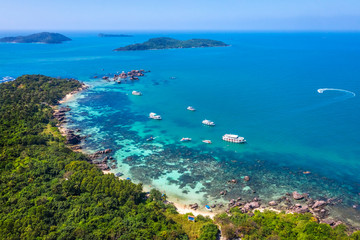 Aerial view of people swimming on the sea and beach on Gam Ghi Phu Quoc island in Thailand bay, Kien Giang, Vietnam.