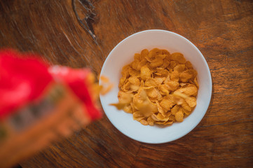 Bowl of corn flakes with milk