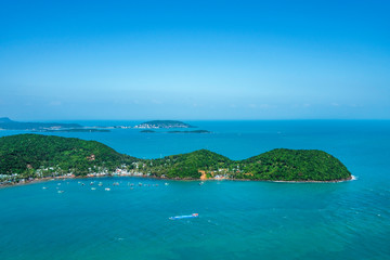 Aerial view of white sand beach and boat on the blue lagoon aqua sea. Royalty high quality free stock image of Gam Ghi island in Phu Quoc, Kien Giang, Vietnam
