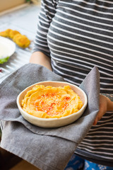 Chickpea hummus with paprika, falafel balls and lettuce leaves on plate. Vegan Israeli Arabian food.