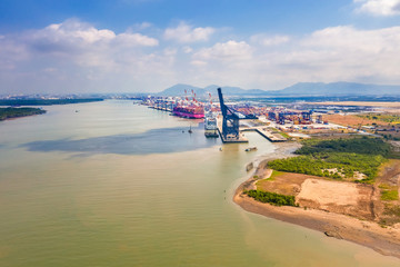 Top view aerial of International  container port Tan Cang - Cai Mep. Ba Ria, Vung Tau, Vietnam. Connect to Ho Chi Minh City by Thi Vai river and national road 51