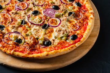 pizza on the black background