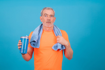 adult or senior man with sportswear isolated on color background