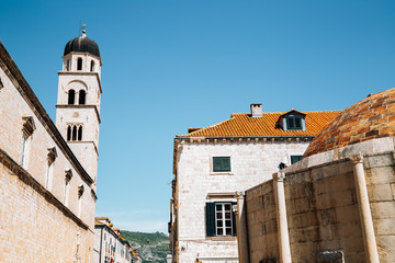 Old town Stradun street, Franciscan Church and Monastery and Large Onofrio's Fountain in Dubrovnik, Croatia
