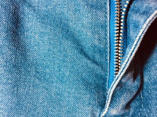 blue jeans with zipper background © Adkan