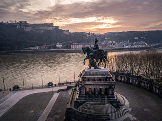 Colorful Sunrise burning sky Koblenz City historic monument German Corner where river rhine and...